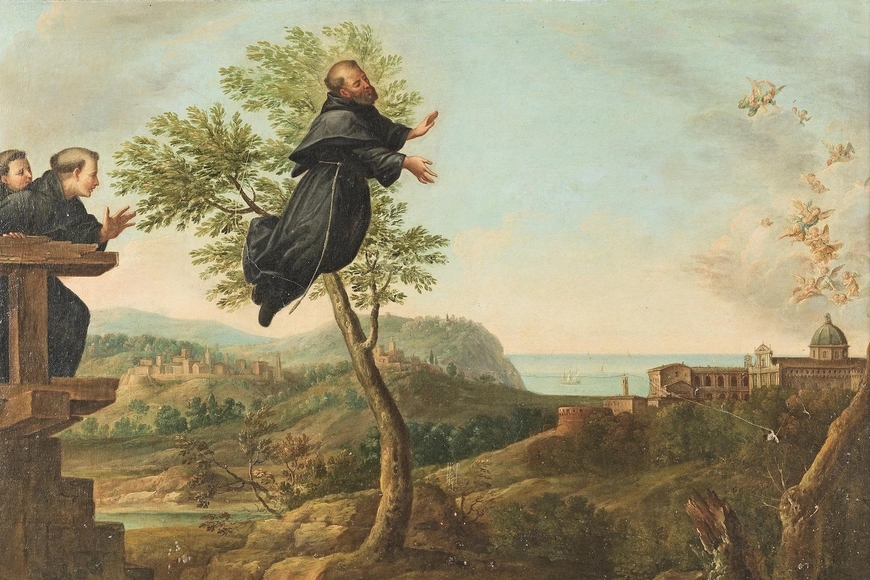 A man wearing a black robe flies through the sky and crosses in front of a tree. Two men also in black robes look on. The landscape is pastoral.