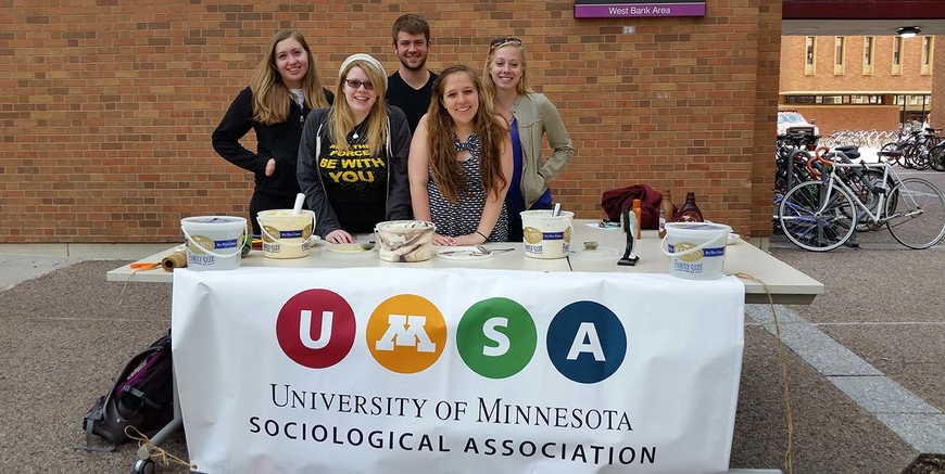 UMSA students hosting table for ice cream social
