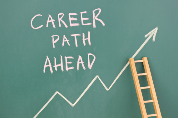 Text "Career Path Ahead" on chalkboard with arrow zigzagging upwards