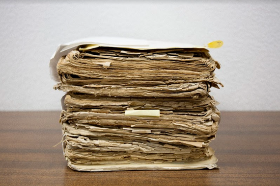 Photograph of a stack of newspapers