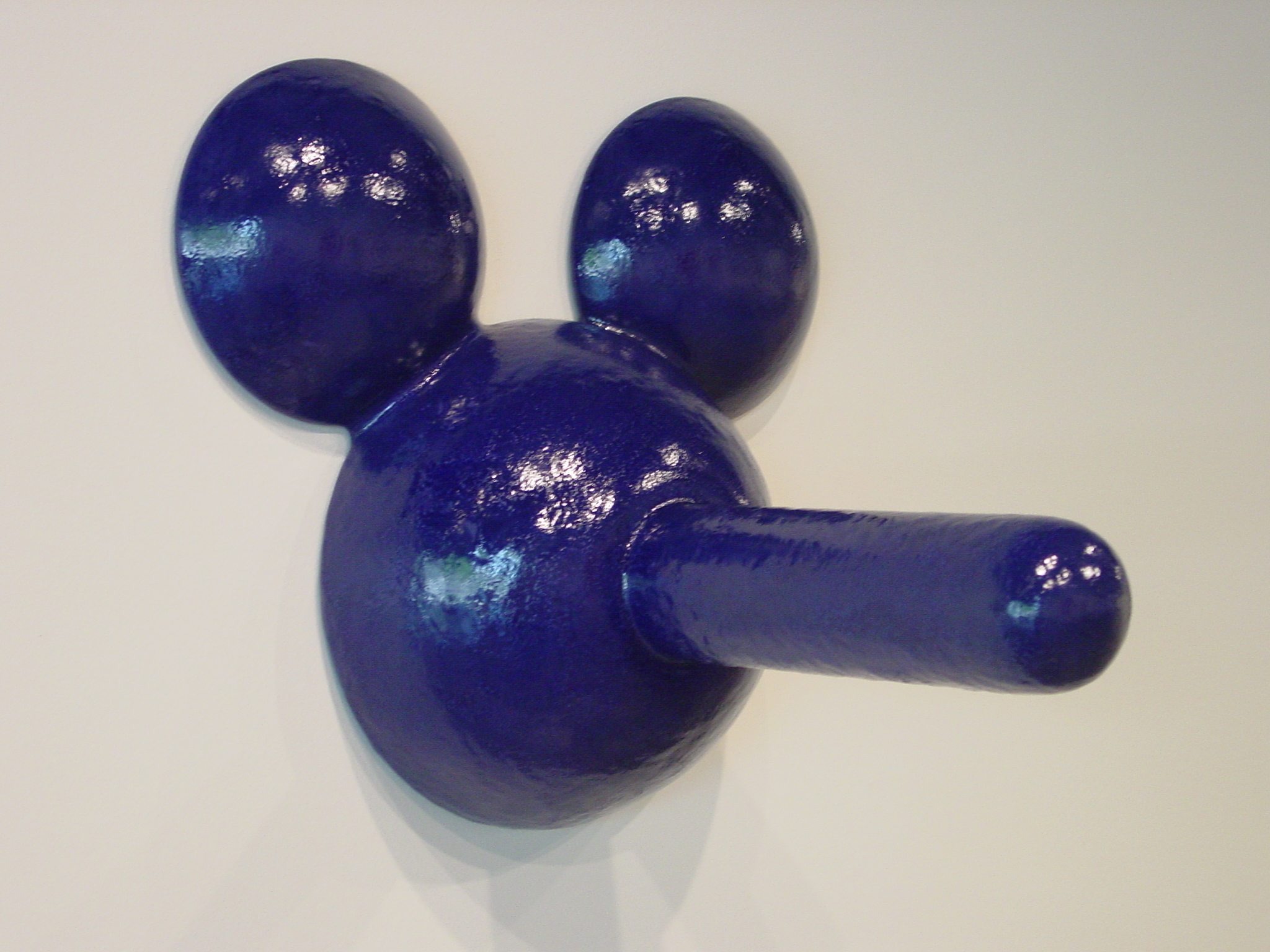Ceramic form of Mickey Mouse with an elongated nose like Pinocchio.