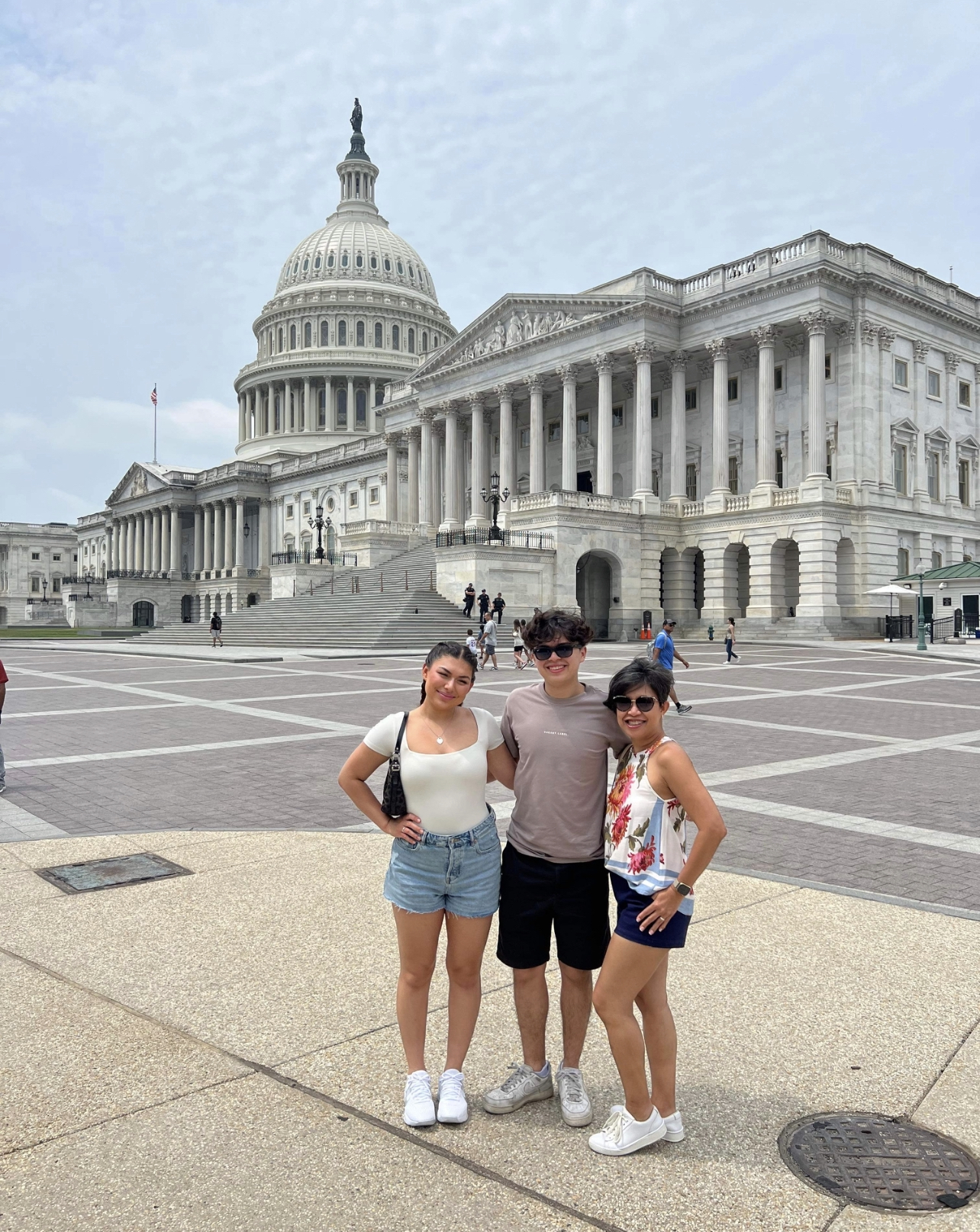 Joslyn (left), Joslyn's brother (middle), and Joslyn's mom (right) outside the US Capitol.