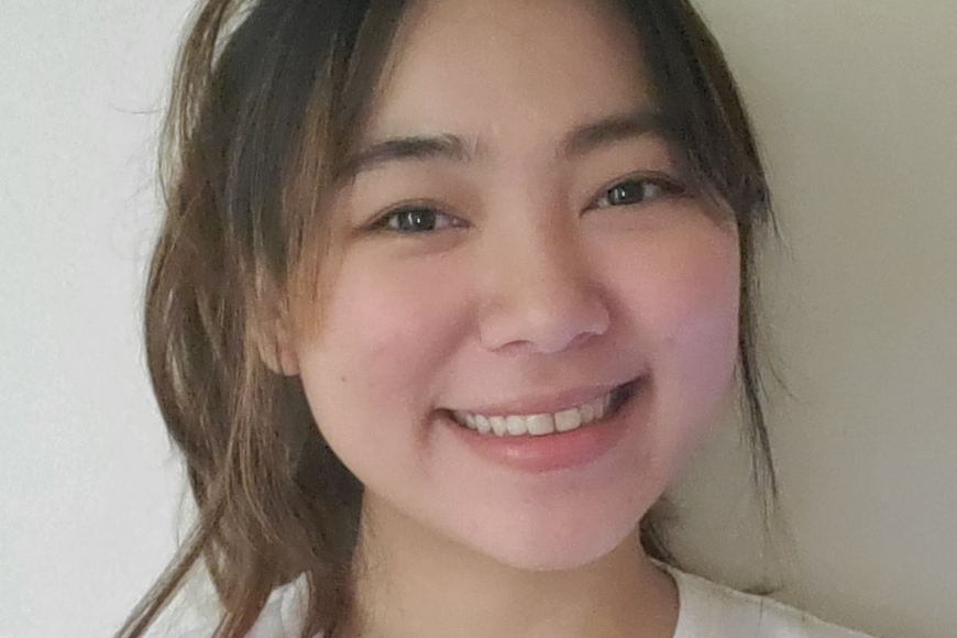 Photo of Zoe Nguyen in a white t-shirt