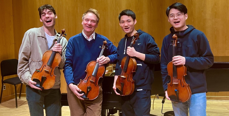Students of Korey Konkol (pictured middle left) celebrate their Schubert Club Win