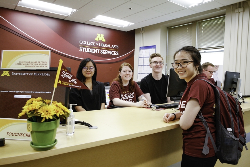 CLA students at the front desk of CLA Student Services office