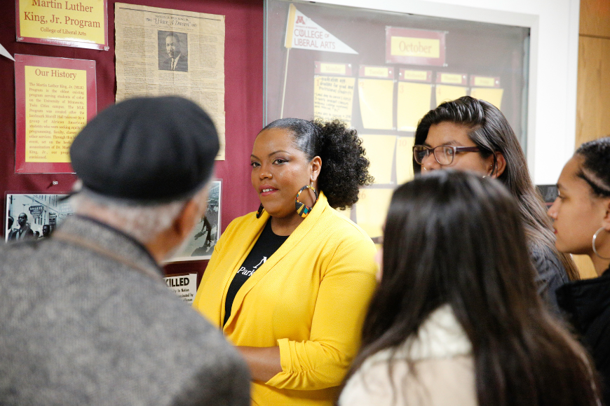 Melanie Johnson engages in conversation with MLK Jr. Program leaders and students