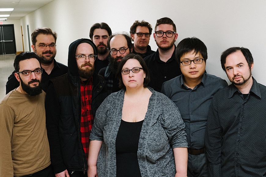 113 Composers Collective group photo. No smiles.