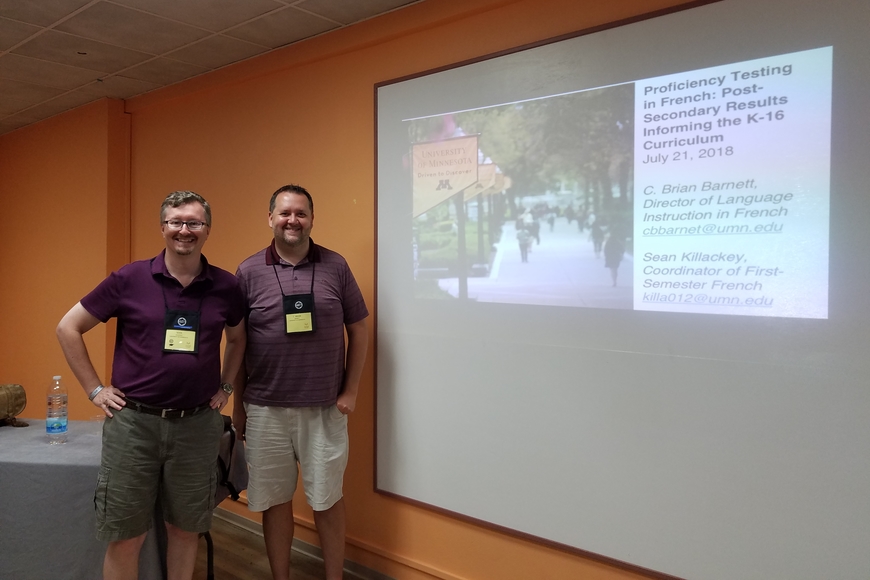 Photo of Brian Barnett and Sean Killackey presenting their research at the AATF convention.