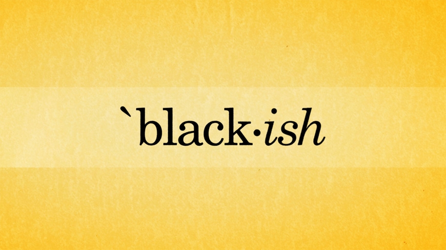 the word "black-ish" typed in black font over a light yellow background