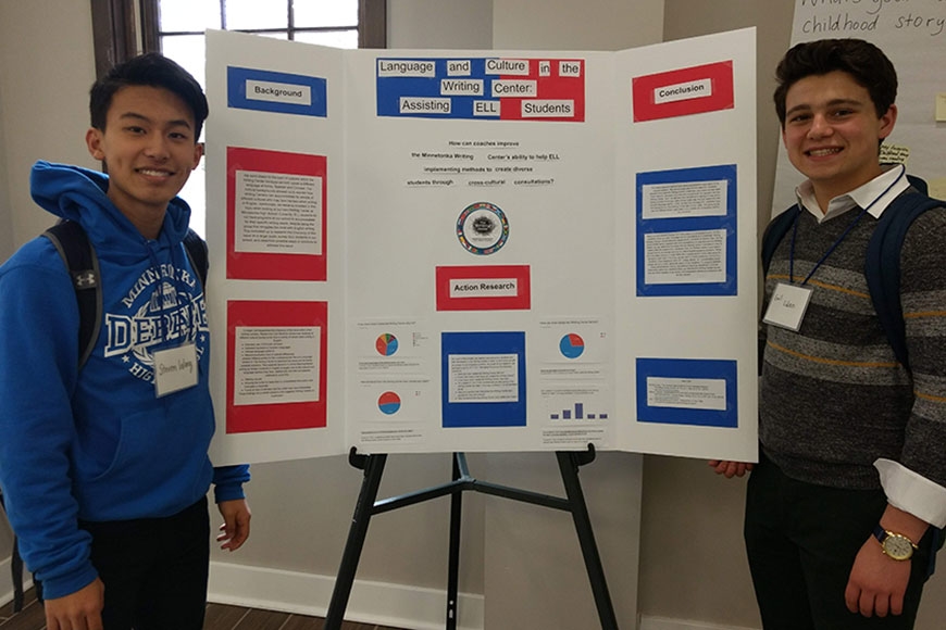 High school writing center coaches Steven Wang (left) and Emil Liden presented their poster on supporting English language learners.
