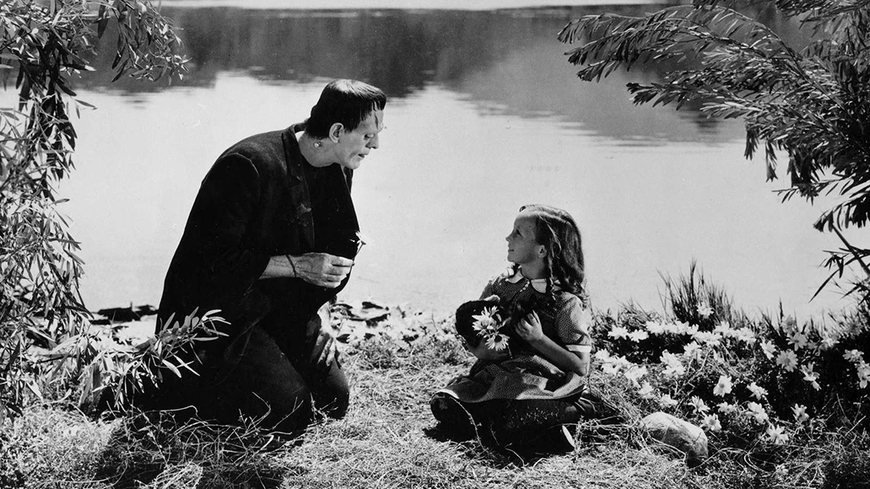 Image of monster and child from 1931 Frankenstein film