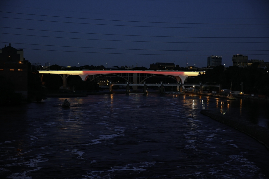 The 35W bridge in Minneapolis is lit up maroon and gold to celebrate CLA's 150th anniversary. 