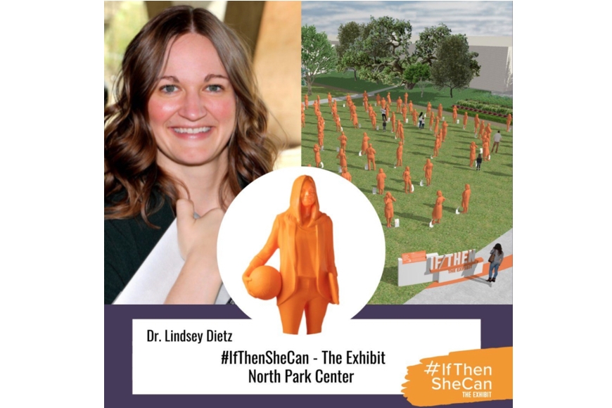 photo of Dr. Lindsey Dietz next to #IfThenSheCan - The Exhibit in North Park Center