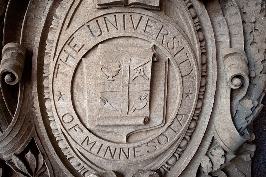 Stone version of the University of Minnesota Regents seal