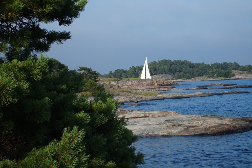 Photo of a sailboat in a coastal area of Sweden
