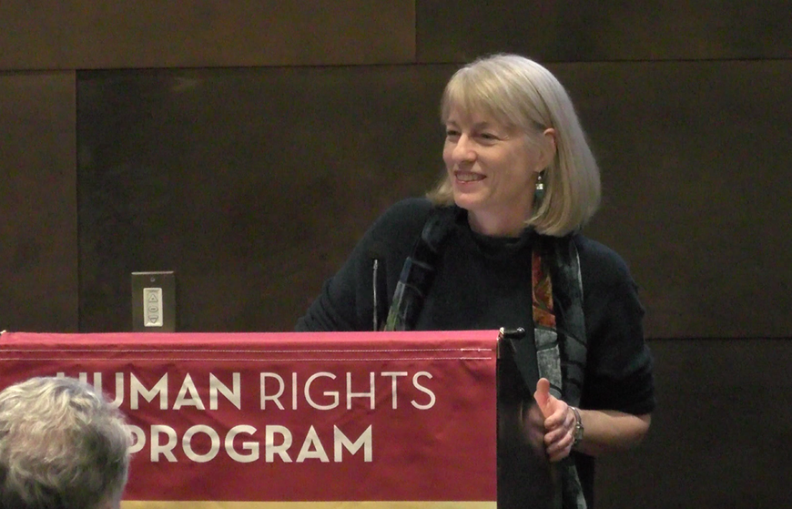 Kathryn Sikkink speaking in front of an audience at the McNamara Alumni Center on March 7, 2018.