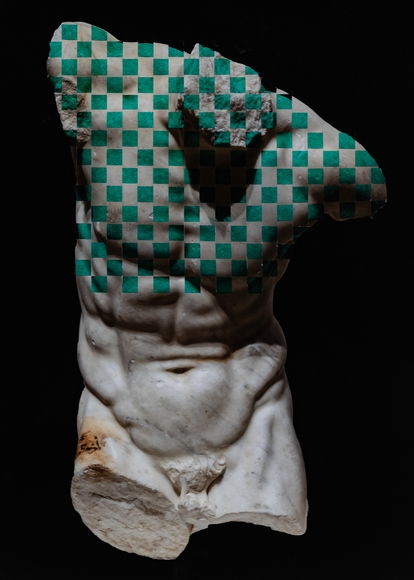 Large scale photograph of nude male antiquity statue form with paper manipulation in the form of paper weaving.