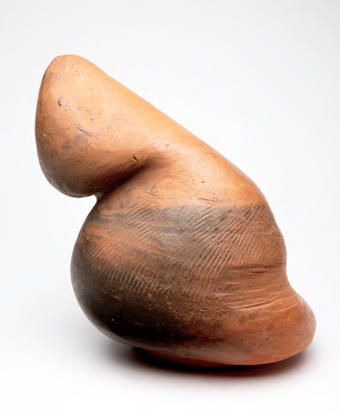 A brown bulbous ceramic sculpture on white background, similar to a thumb with score marks near the bottom.