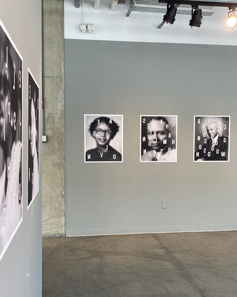 Row of blurry photos of Black Americans in an art gallery