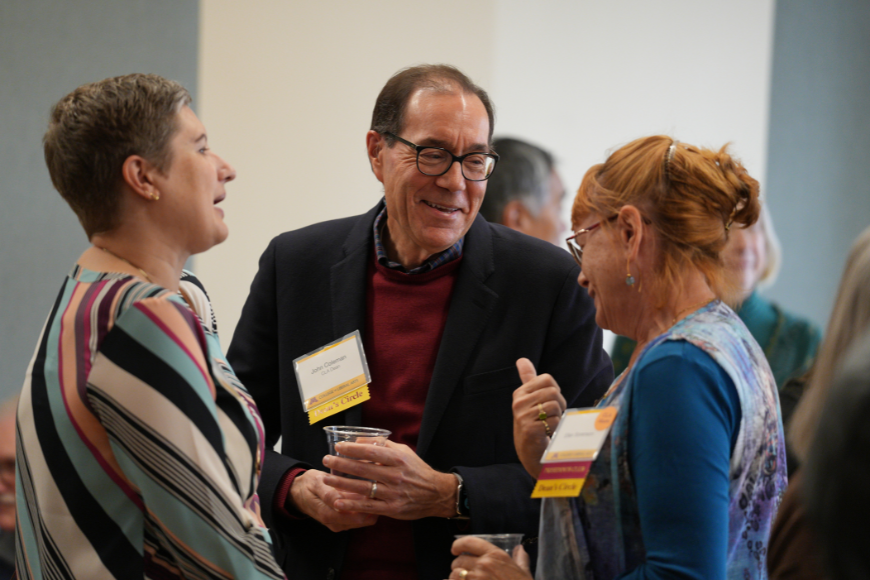 Dean Coleman engaging in conversation during the Collage Concert Reception