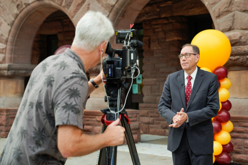 Dean Coleman prepares for a video interview during the Pillsbury Hall Grand Opening