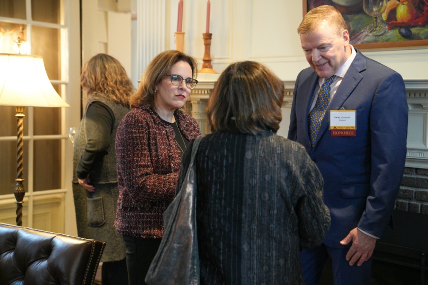 President Joan T.A. Gabel and Kelley Lindquist engaged in conversation.