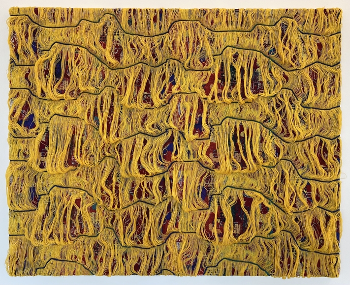 Yellow and red abstract textile artwork