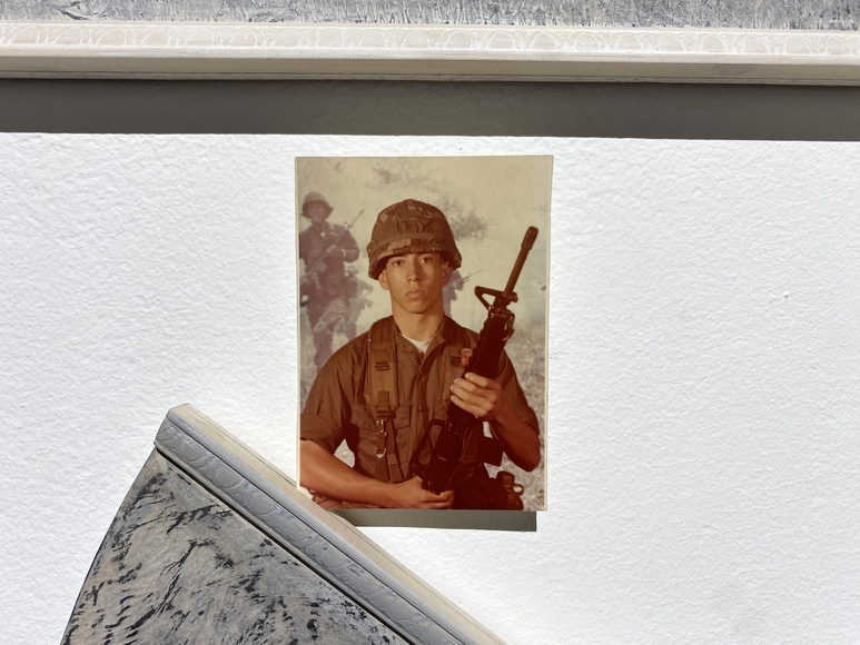 Photo of a soldier holding a gun