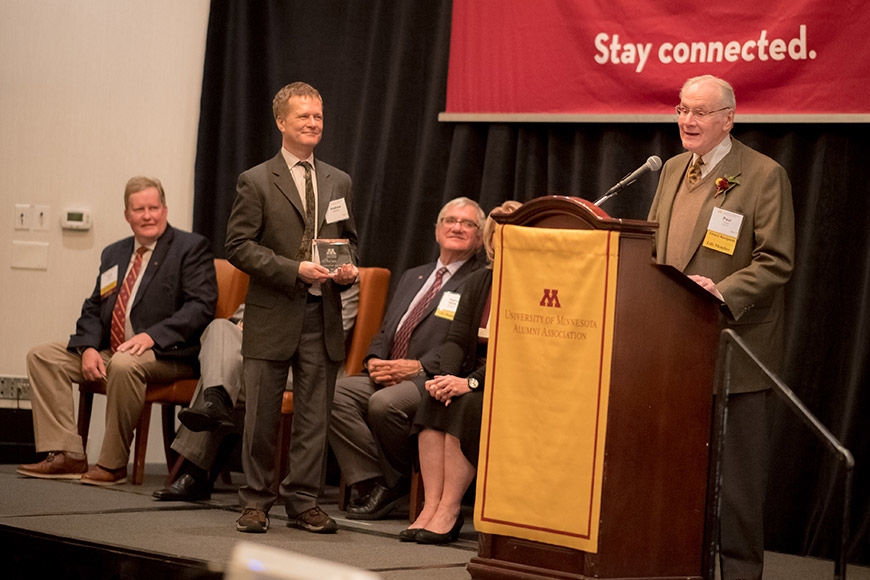 Alumnus Paul Taylor receives award from Prof. Andrew Elfenbein