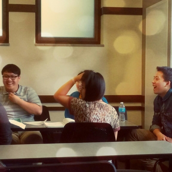 Hmong Student Group talking at table