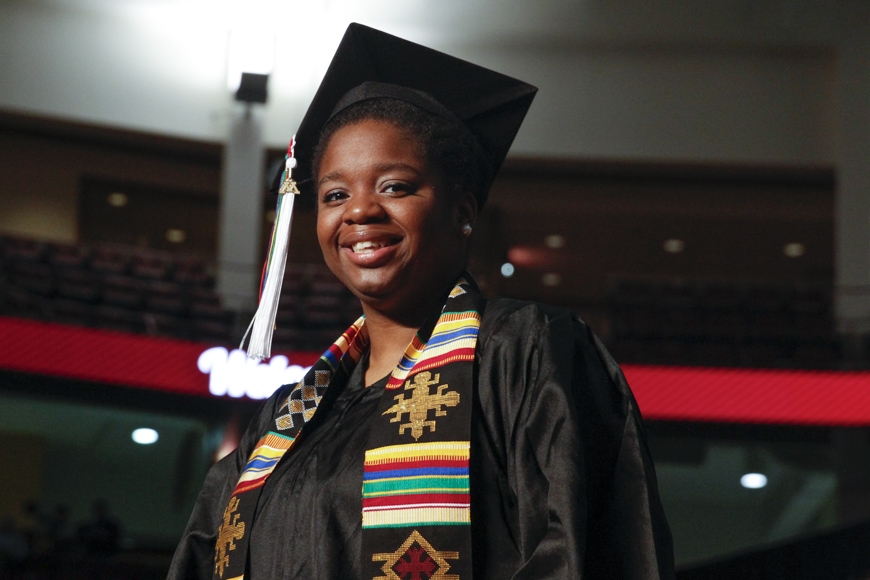 Spring 2015 CLA Commencement - graduate in cap and gown