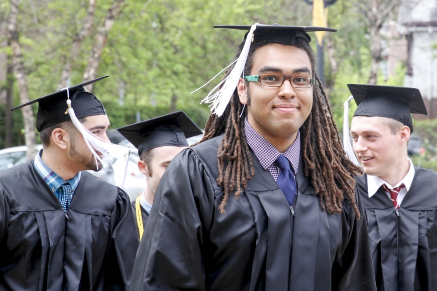Spring 2015 CLA Commencement - student in cap and gown