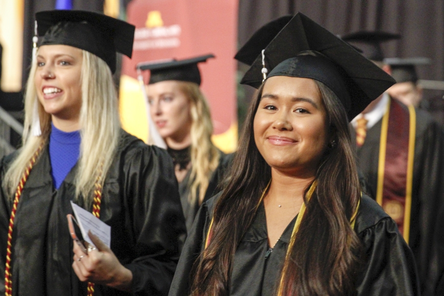 Spring 2015 CLA Commencement - graduate in cap and gown