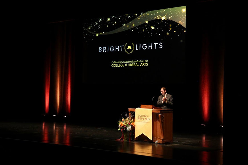 Photo of Dean John Coleman speaking at the Bright Lights event