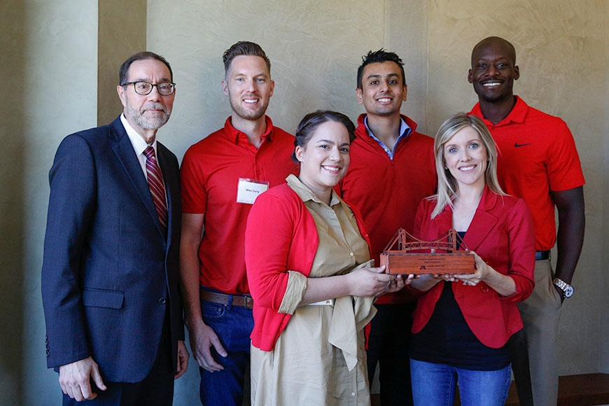 John Coleman stands with a group of people from Target, which received a Civitas Award.