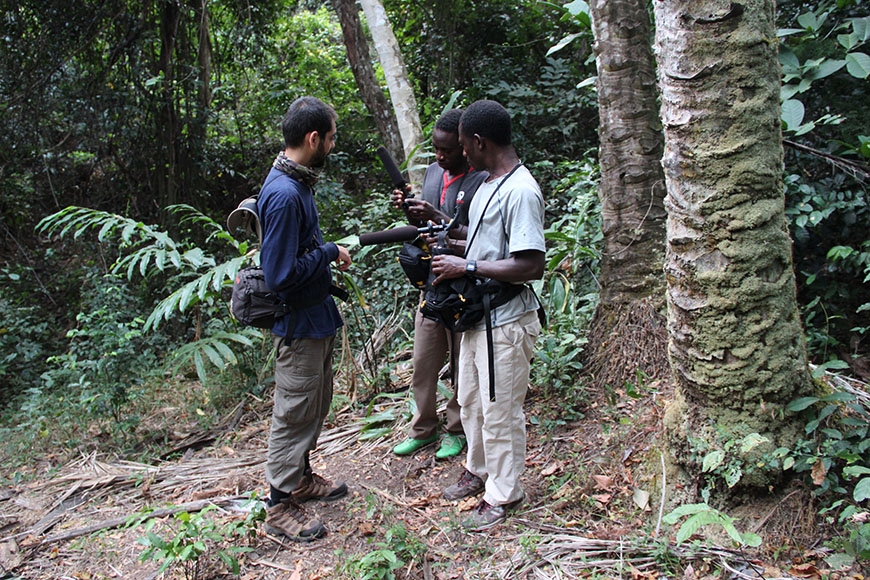 Desai demonstrates recording techniques to Gombe field assistants.