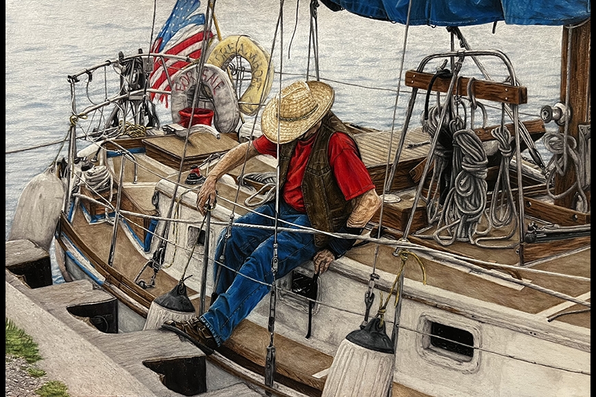 An elderly man dressed in a straw cowboy style hat sits on the side of a sailboat with his foot resting on the dock as he lifts one of the boat’s buoys with his right hand. 