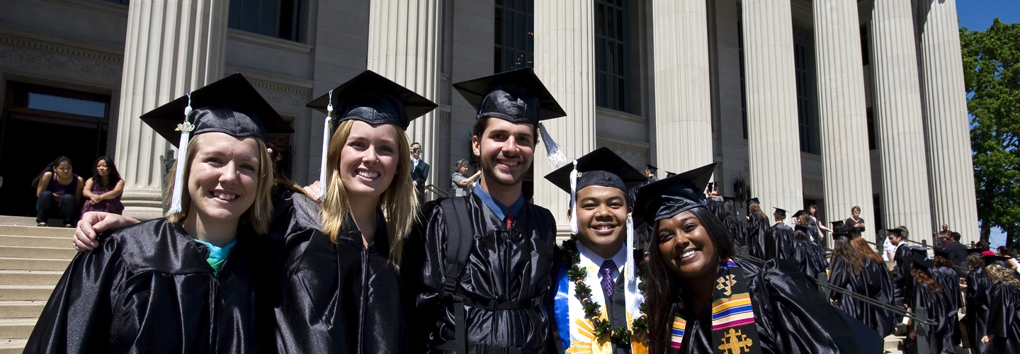 Five CLA students in graduate caps and gowns