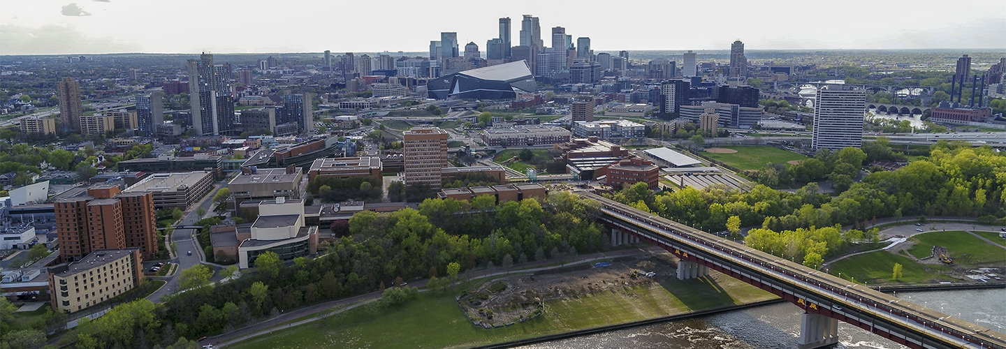 Aerial image of West Bank campus with downtown Minneapolis in background