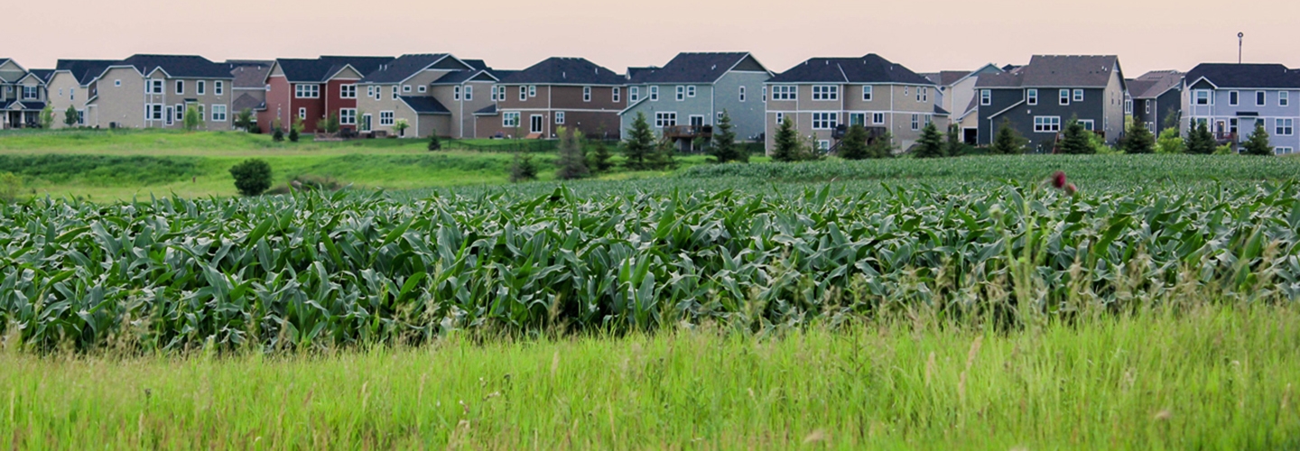 Landscape of housing and farm land