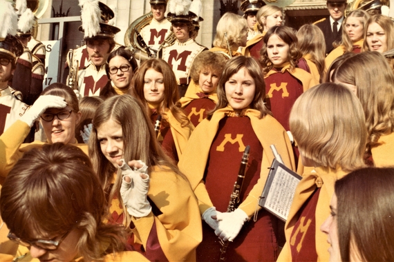 A group of Minnesota marching band members, including women who were first admitted into the band in 1972. 