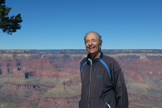 Elliot Rothenberg standing in front of the Grand Canyon