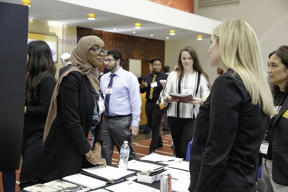 Student talking with an Employer at a Career Fair