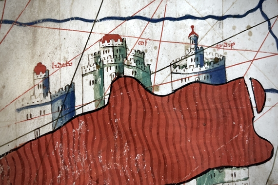 Portolan map by Petrus Roselli, year 1466. Three two-dimensional castles sit above the red sea. Hand color on parchment. Bell Digital Collections.