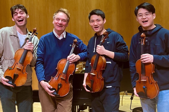 Students of Korey Konkol (pictured middle left) celebrate their Schubert Club Win