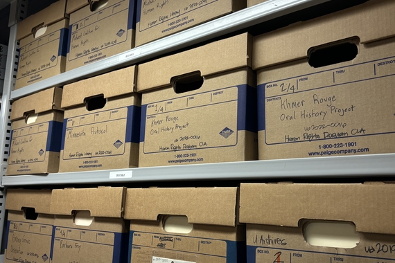 Boxes of materials from the Human Rights Program, housed in the underground archives of Andersen Library.