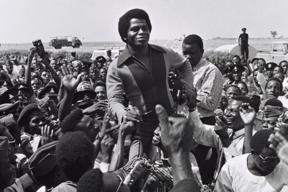 Image credit: New York Public Library via Unsplash. Singer James Brown being greeted by fans upon his arrival at Kaduna Airport, 1970.