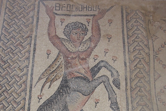 Ancient Mosaic of a creature that is half man and half horse