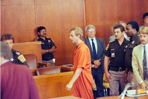 Picture of suspected serial killer Jeffrey L. Dahmer is escorted out court