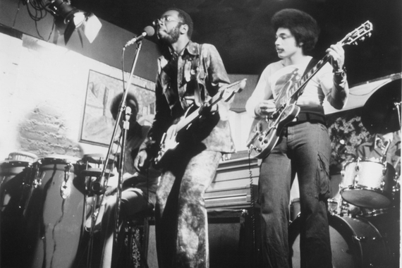 Curtis Mayfield and his band performing on set during the production of the 1972 film Super Fly.
